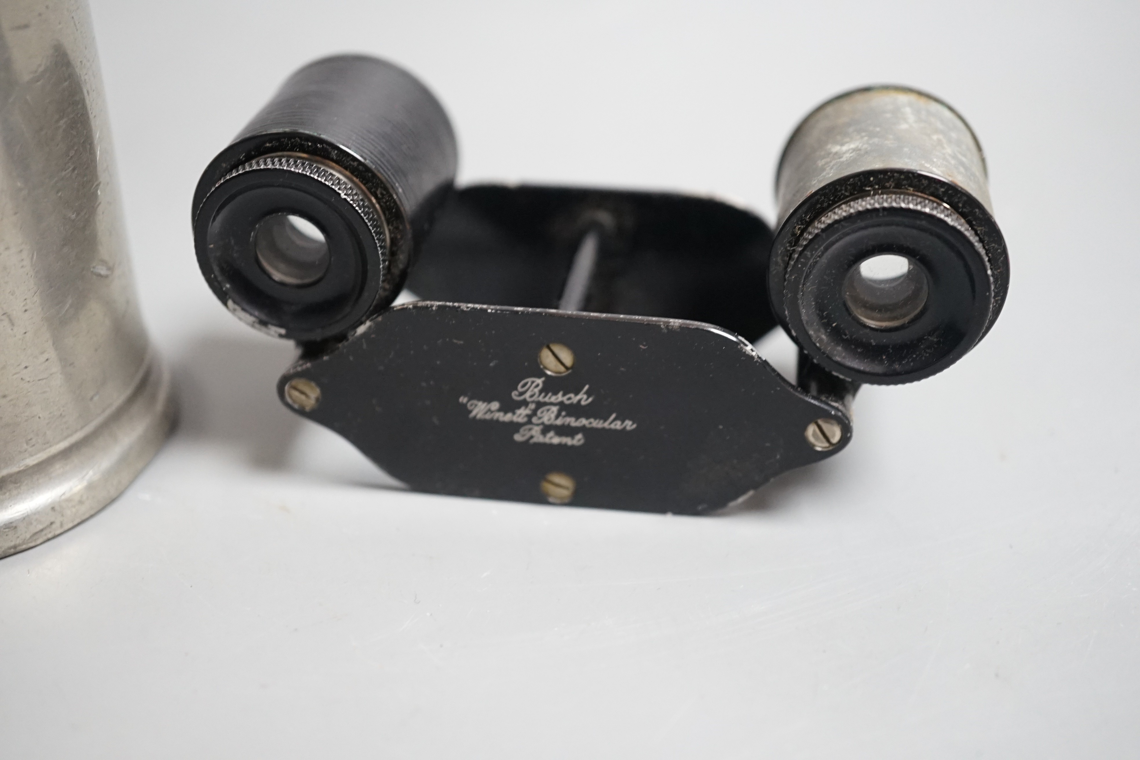 A pair of Busch Winett binoculars in clip case, together with pewter tankard